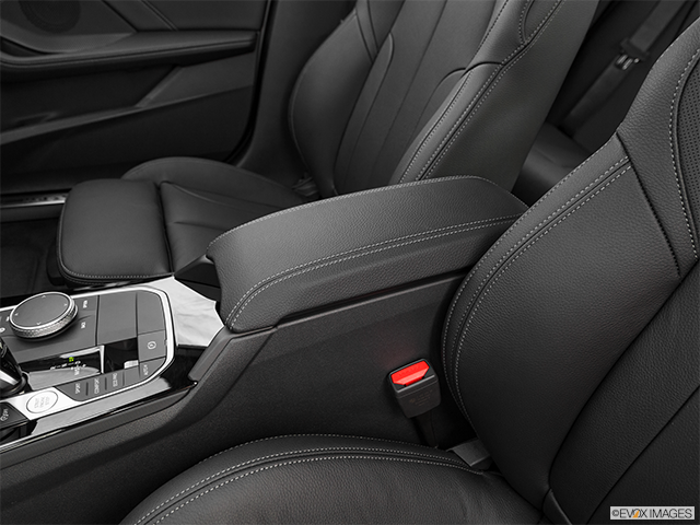 2024 BMW 2 Series | Front center console with closed lid, from driver’s side looking down