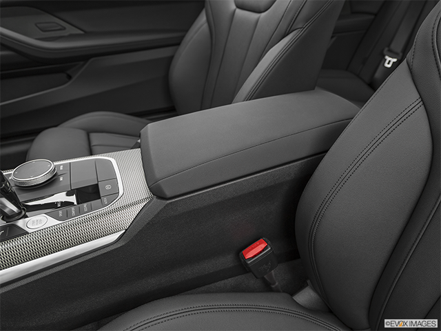2023 BMW 4 Series | Front center console with closed lid, from driver’s side looking down