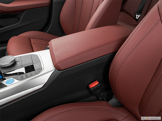 2024 BMW i4 | Front center console with closed lid, from driver’s side looking down