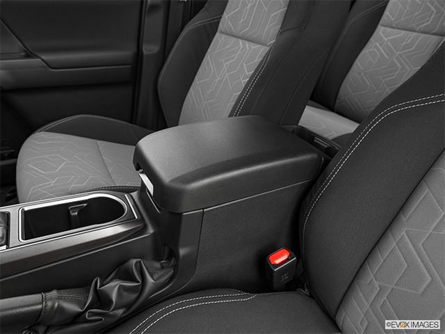 2023 Toyota Tacoma | Front center console with closed lid, from driver’s side looking down