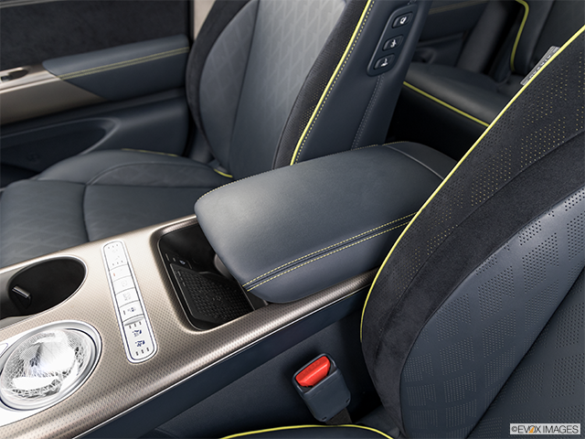 2024 Genesis GV60 | Front center console with closed lid, from driver’s side looking down
