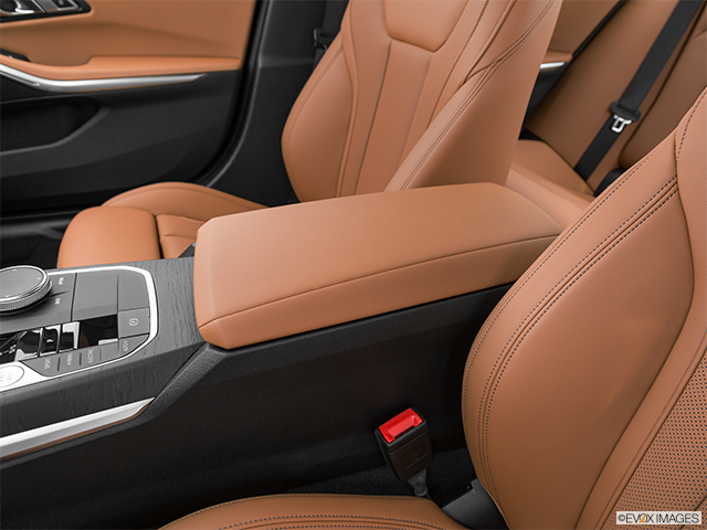 2023 BMW 3 Series | Front center console with closed lid, from driver’s side looking down