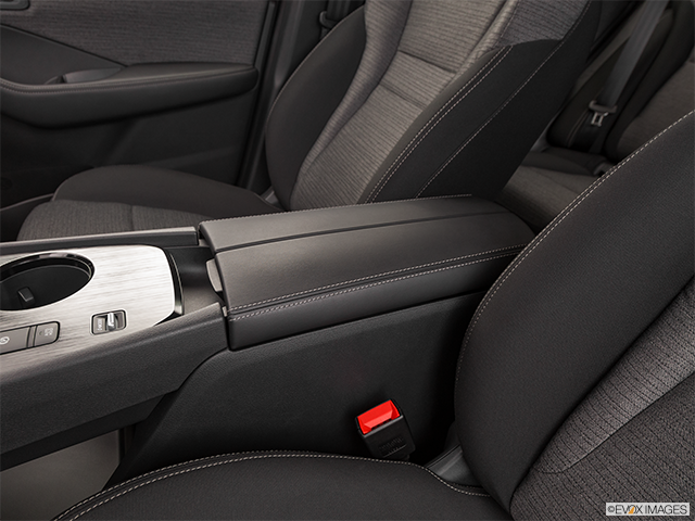 2023 Nissan Rogue | Front center console with closed lid, from driver’s side looking down