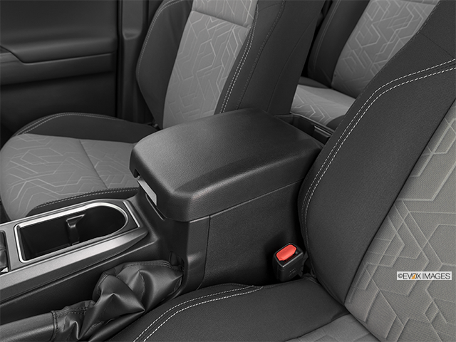 2023 Toyota Tacoma | Front center console with closed lid, from driver’s side looking down