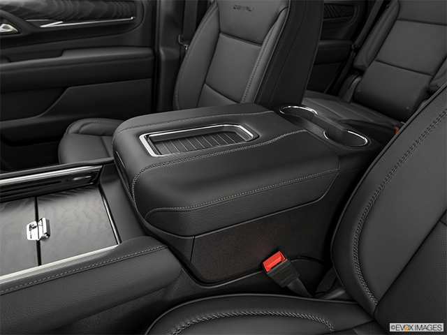2024 GMC Yukon | Front center console with closed lid, from driver’s side looking down