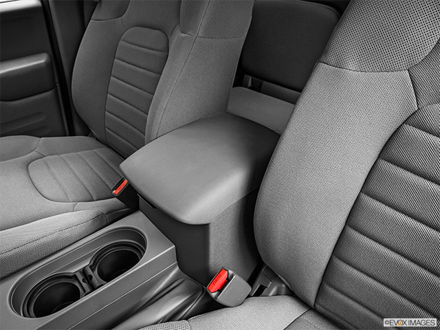 2015 Nissan Frontier | Front center console with closed lid, from driver’s side looking down