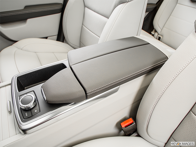 2015 Mercedes-Benz M-Class | Front center console with closed lid, from driver’s side looking down