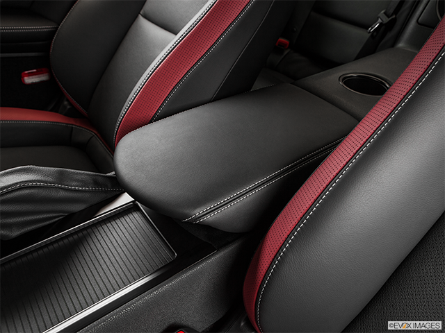 2015 Nissan GT-R | Front center console with closed lid, from driver’s side looking down