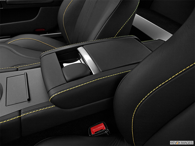 2015 Aston Martin V12 Vantage | Front center console with closed lid, from driver’s side looking down