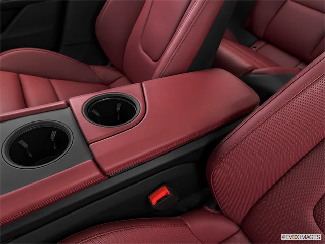 2027 Porsche Taycan | Front center console with closed lid, from driver’s side looking down