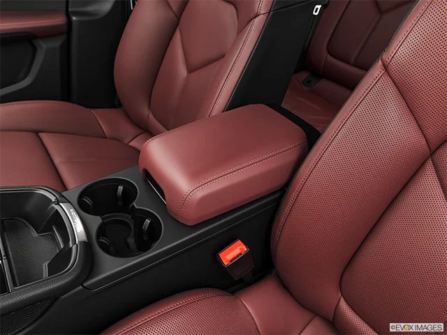 2027 Porsche Macan | Front center console with closed lid, from driver’s side looking down